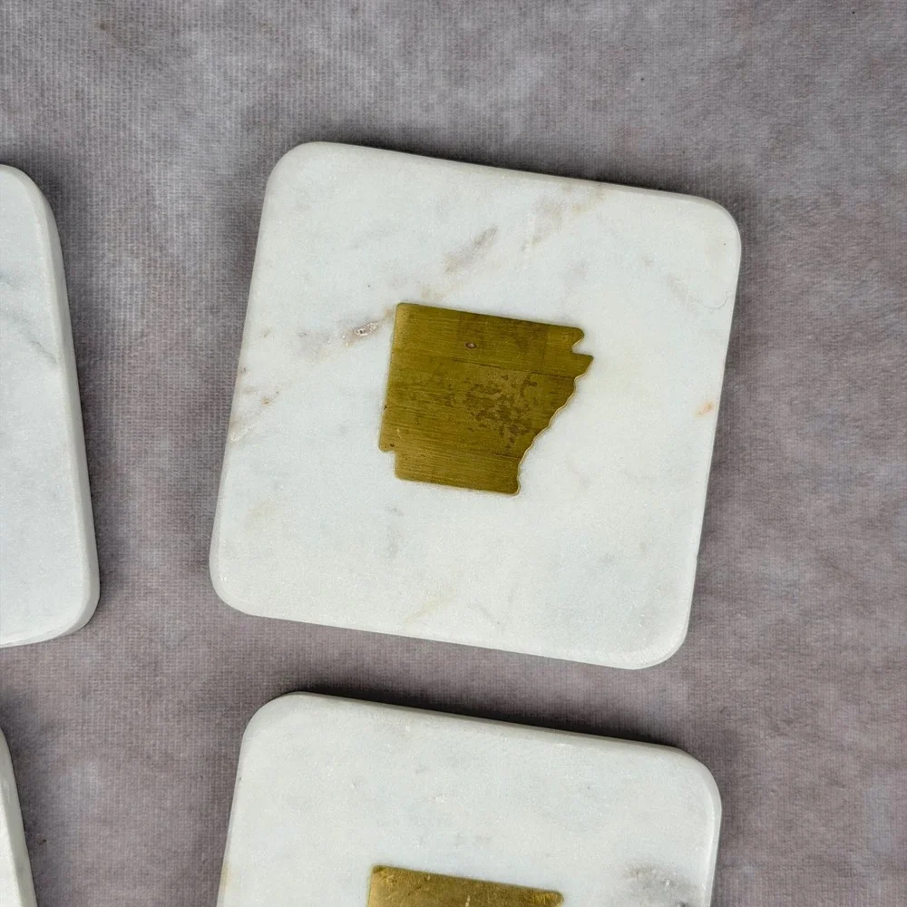 The Royal Standard White Marble Arkansas Brass Inlay Coasters Set of 4